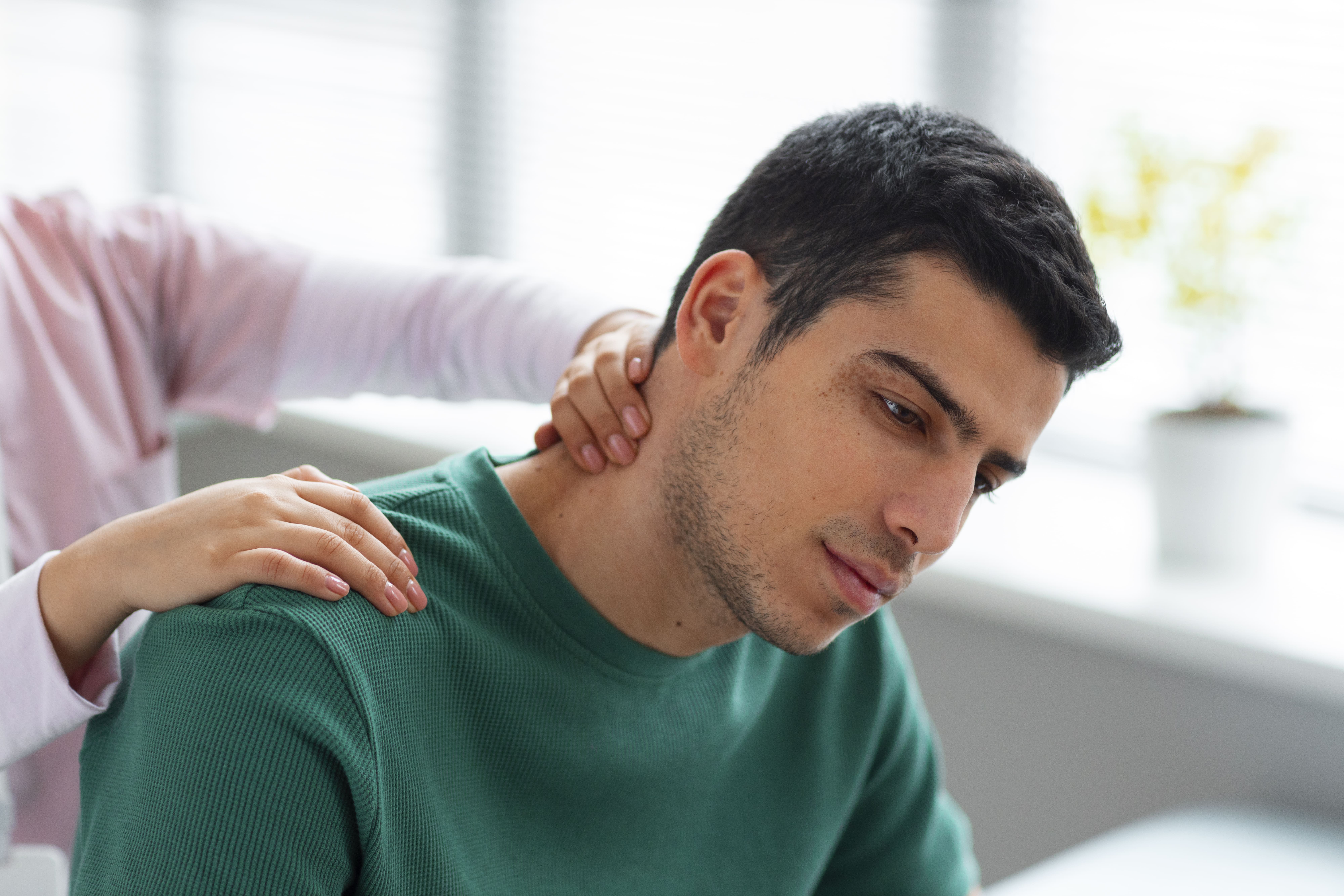 doctor-helping-patient-rehabilitation (1) Chronic Neck Pain and Spinal Decompression